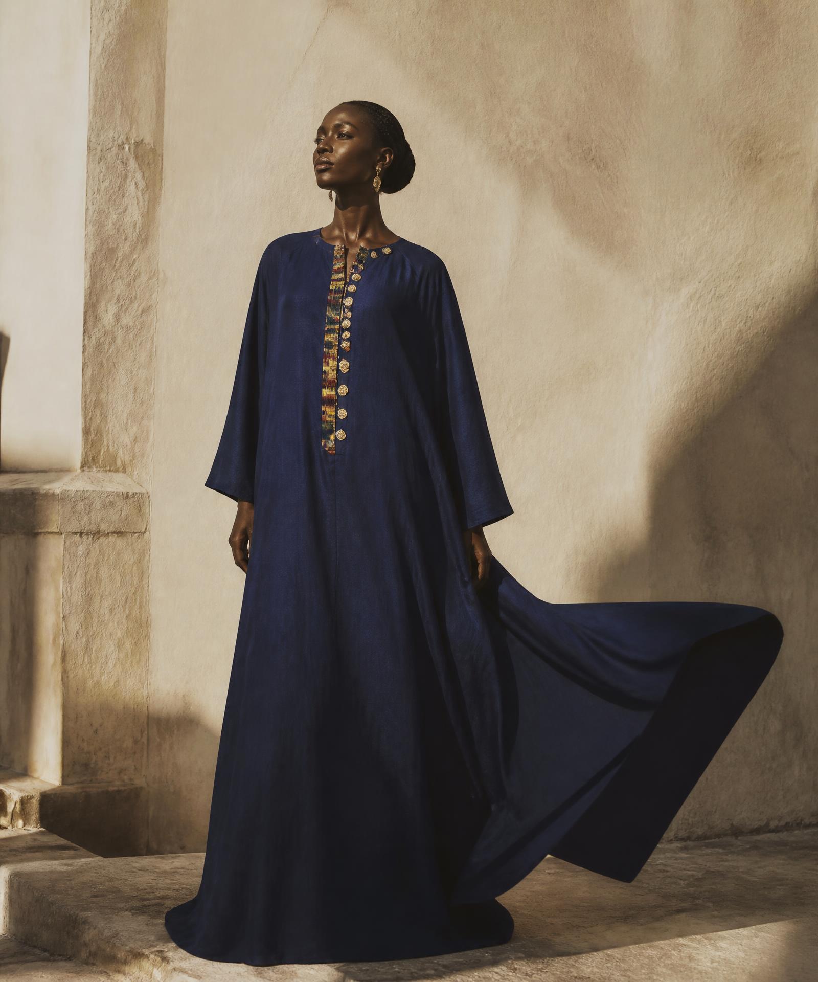 Design study for the Adom Boubou, a floor-length modest silhouette in deep indigo