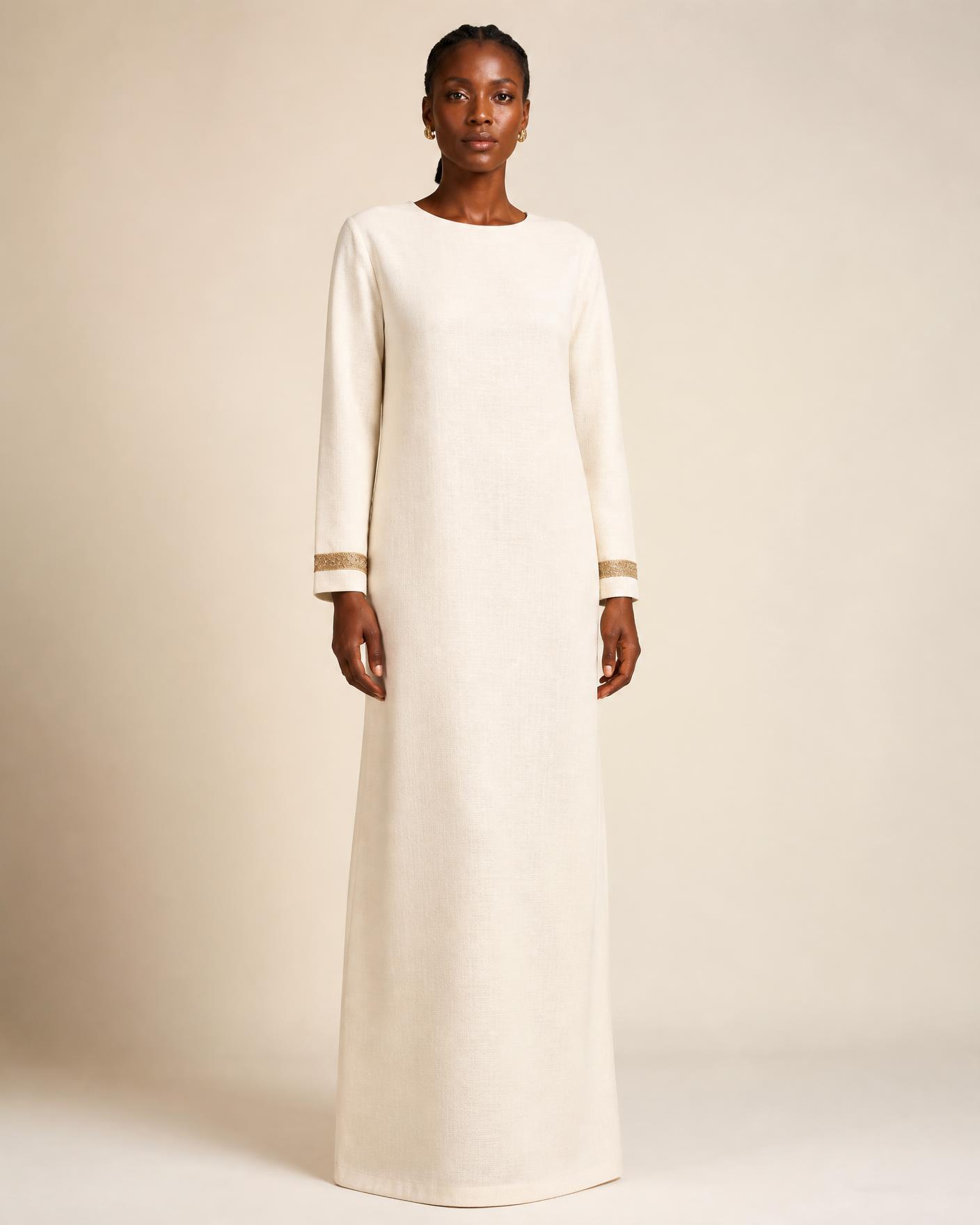 Model in the Harmattan Column Dress in warm ivory